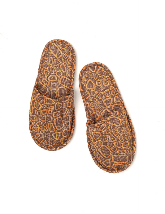 Elevate your downtime with our Quilted Slippers. Ethical, sustainable, and crafted by female artisans in Mumbai, these slippers offer cushioned comfort with a touch of chic style. Warm on the inside, fashionable on the outside, step into sustainable luxury.