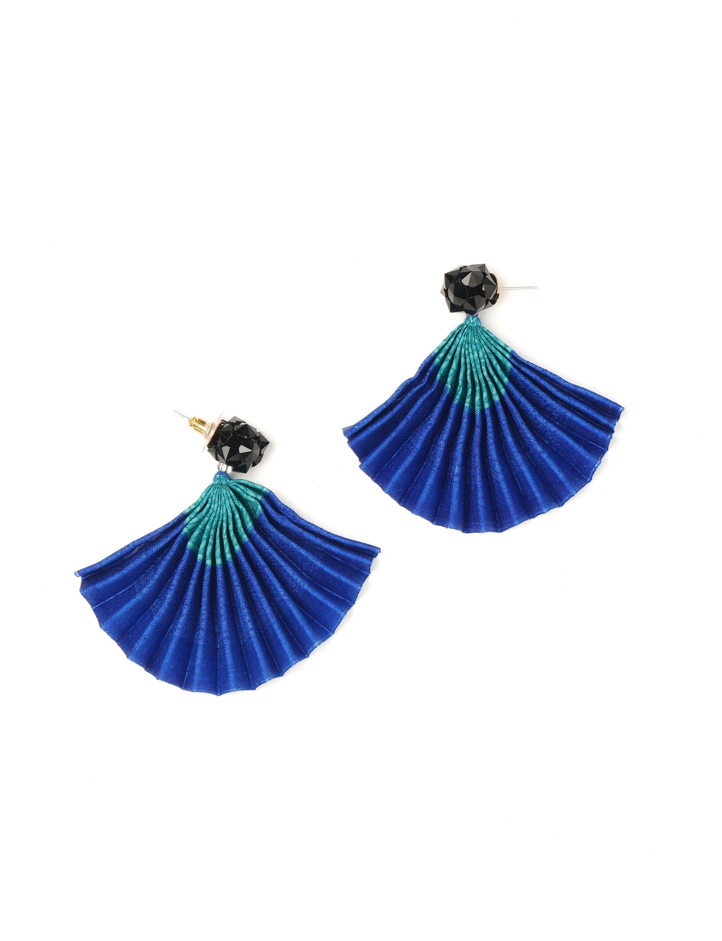 Elevate your style sustainably with our PLEATED EARRINGS – a harmonious blend of ethical fashion and eco-conscious design. Fashioned using innovative heat setting techniques on pre-loved Indian saris, these accessories showcase a commitment to slow fashion and upcycled fashion. Enjoy planet-friendly charm with hypoallergy tested metal hooks, nickel, and lead-free for a skin-friendly touch.