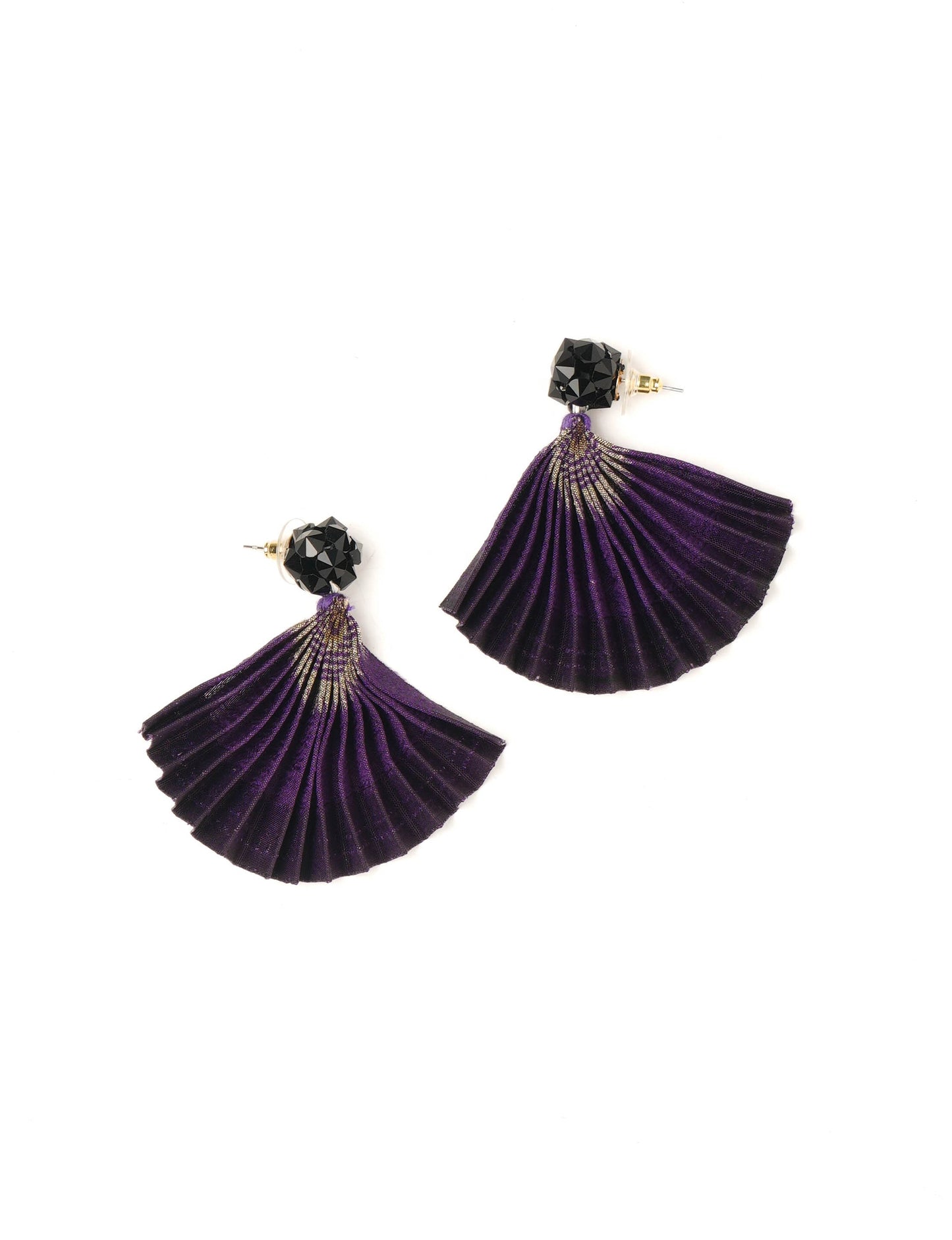 Elevate your style sustainably with our PLEATED EARRINGS – a harmonious blend of ethical fashion and eco-conscious design. Fashioned using innovative heat setting techniques on pre-loved Indian saris, these accessories showcase a commitment to slow fashion and upcycled fashion. Enjoy planet-friendly charm with hypoallergy tested metal hooks, nickel, and lead-free for a skin-friendly touch.