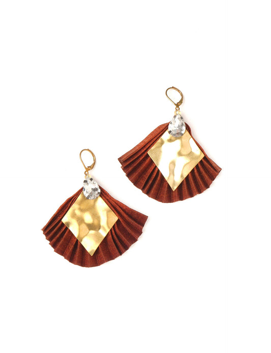 Elevate your style sustainably with our PLEATED EARRINGS – a fusion of ethical fashion and eco-conscious design. Created from pre-loved saris using heat set pleats, these earrings embody zero waste clothing and upcycled fashion. Fastened with hooks, adorned with a diamond-shaped metallic plate and a special drop-shaped jewel. Hypoallergy tested metal hooks, nickel, and lead-free, making them a conscious and skin-friendly accessory.