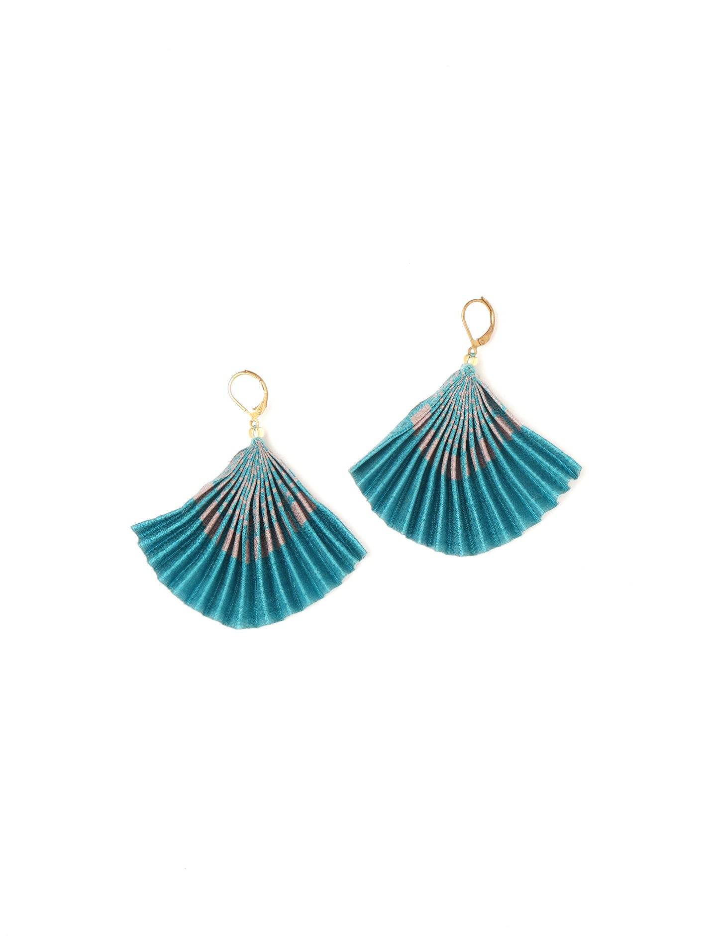 Elevate your style sustainably with our PLEATED EARRINGS – a timeless creation from pre-loved Indian saris, crafted using innovative heat setting techniques. Align with ethical clothing, green fashion, and slow fashion, these earrings are a statement of mindful elegance. Hypoallergy tested metal hooks make them a skin-friendly, sustainable choice.