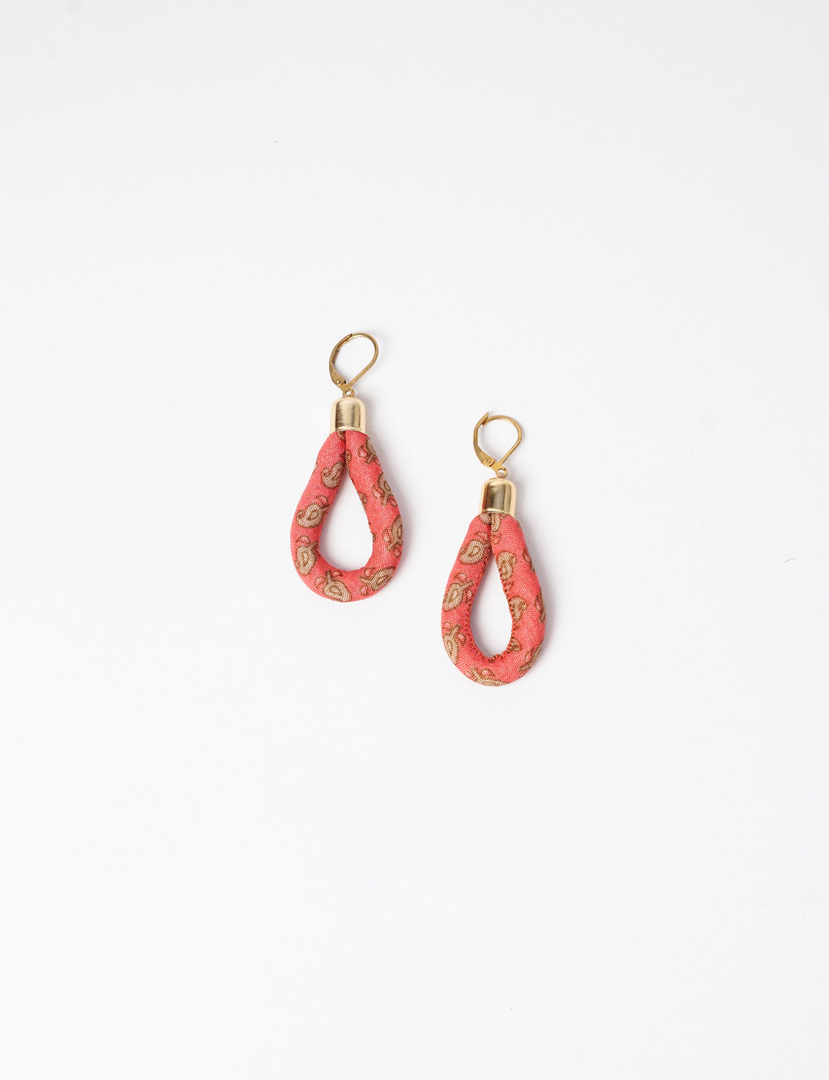 Elevate your style sustainably with our Rope Earrings. Crafted from cotton rope hand-wrapped with pre-loved saris, these earrings are a testament to ethical and green fashion. Make a conscious choice for a brighter, eco-friendly future.