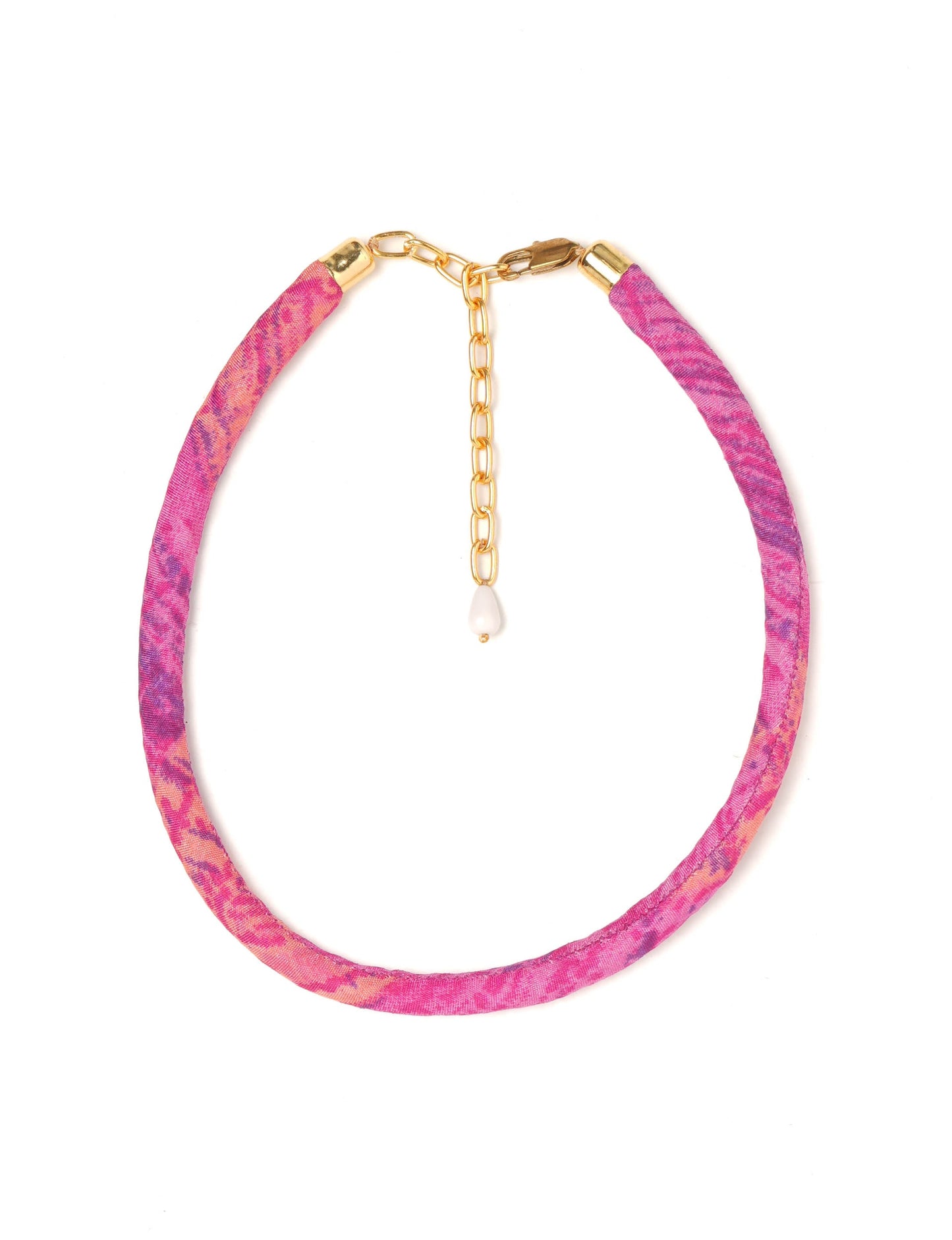 Elevate your look sustainably with our Rope Necklace. Crafted using cotton rope hand-wrapped with pre-loved Indian saris, this necklace is a testament to ethical and green fashion. Make a conscious choice for a brighter, eco-friendly future with this unique, upcycled accessory.