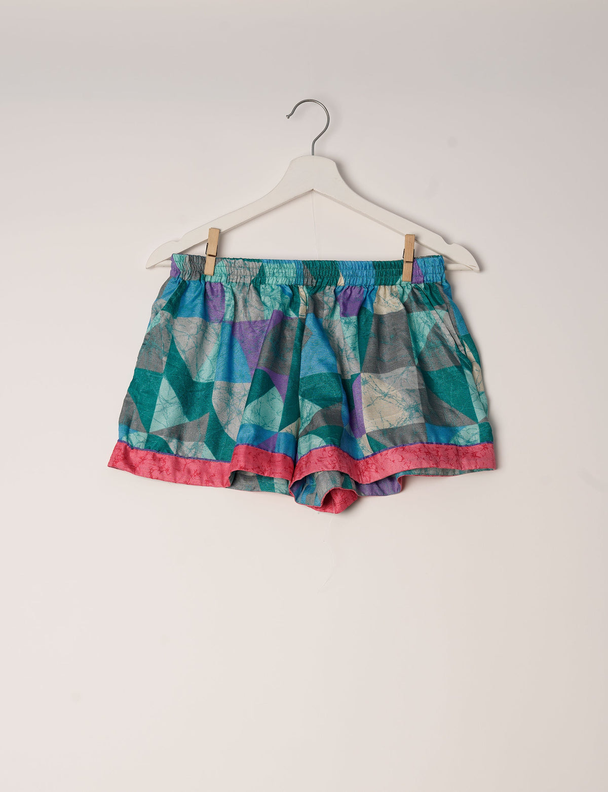 Indulge in comfort and style with our PJ Set Short, now with short sleeves. Crafted from upcycled saris, these shorts embody a zero-waste mentality for sustainable sleepwear. Versatile from day to night, perfect for beach lounging or poolside yoga, these pajamas redefine conscious fashion.
