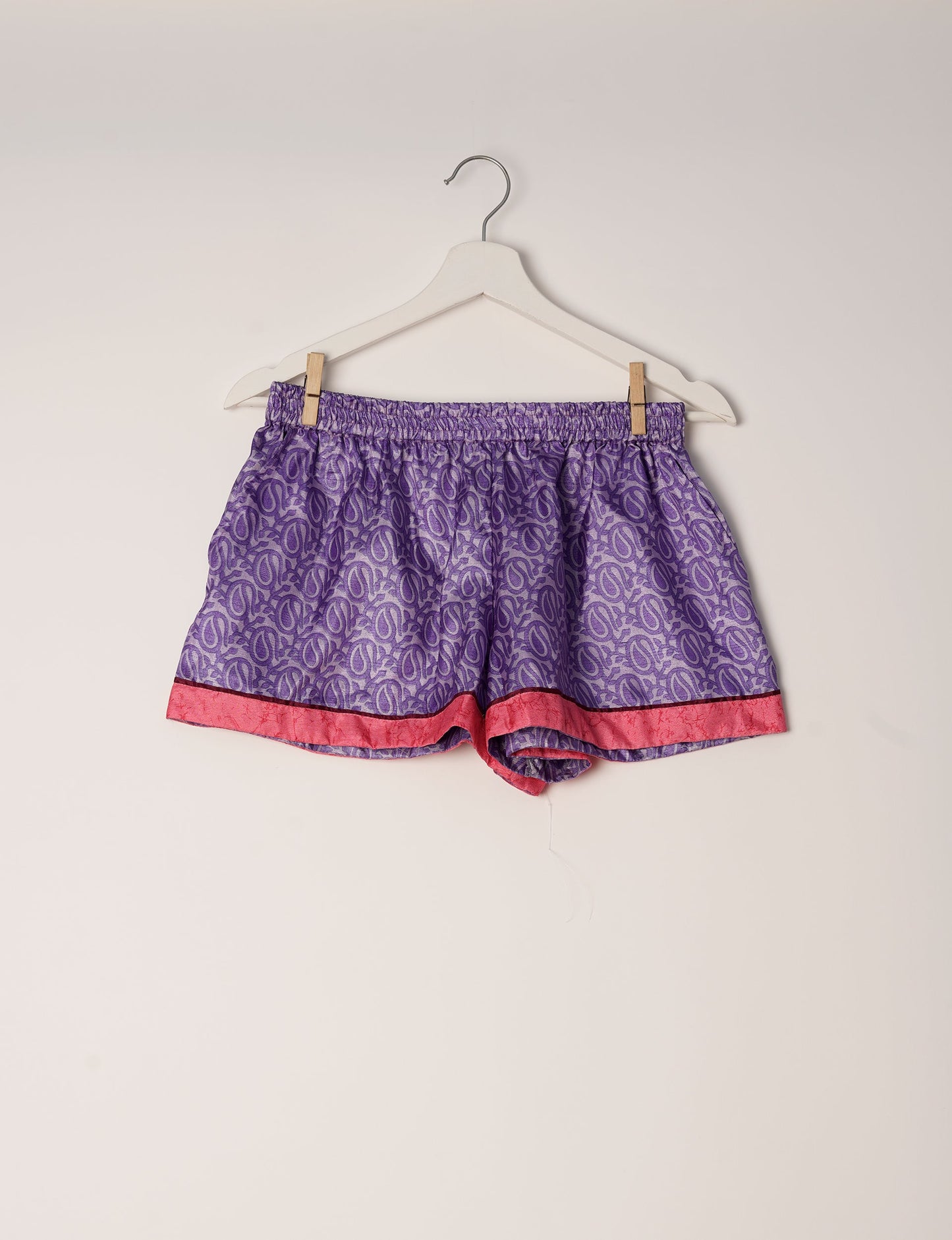 Indulge in comfort and style with our PJ Set Short, now with short sleeves. Crafted from upcycled saris, these shorts embody a zero-waste mentality for sustainable sleepwear. Versatile from day to night, perfect for beach lounging or poolside yoga, these pajamas redefine conscious fashion.