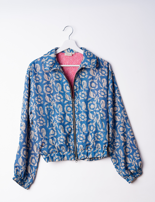 Stylish BOMBER JACKET, an upcycled clothing masterpiece with a cute cropped shape, elasticated details, and detachable metallic zipper. Contrast sari print lining adds a unique touch. Explore sustainable and eco-friendly fashion.