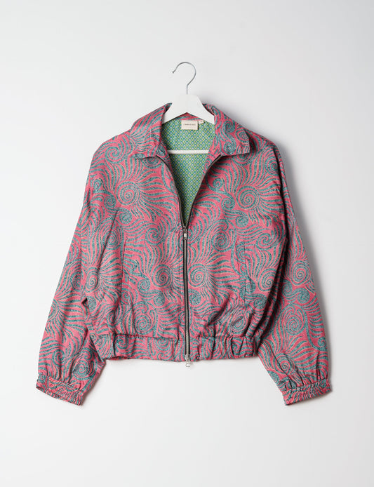 Stylish BOMBER JACKET, an upcycled clothing masterpiece with a cute cropped shape, elasticated details, and detachable metallic zipper. Contrast sari print lining adds a unique touch. Explore sustainable and eco-friendly fashion.