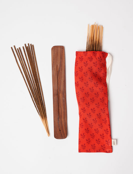 Discover serenity with our Incense Stick Set, presented in a beautifully crafted sari pouch. Made from fragrant flowers, these incense sticks embody eco-friendly products and sustainable living, perfect for conscious consumers seeking ethical clothing and green fashion alternatives.