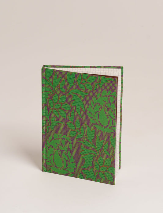 Elevate your scribbling experience with our A5 hardcover notebook, an epitome of green fashion. Sustainable and upcycled, this notebook features recycled fabric covers and aligns with the ethos of circular fashion. Dive into conscious living with our eco-friendly, recycled material notebook.
