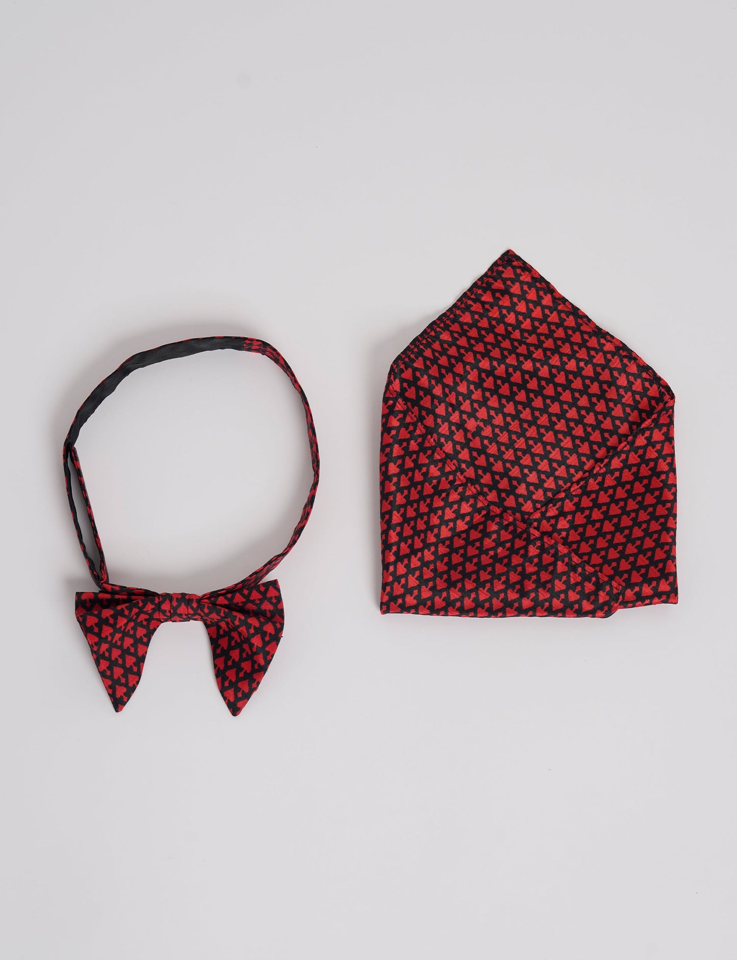 Dapper BOW TIE & POCKET SQUARE SET, ethically handcrafted with lively prints and eye-catching colors. Made by Mumbai-based craftswomen, this ensemble adds excitement to classic formal-wear. Sustainable fashion supporting fair trade, slow fashion, and empowering women artisans. A powerful story of transformation.