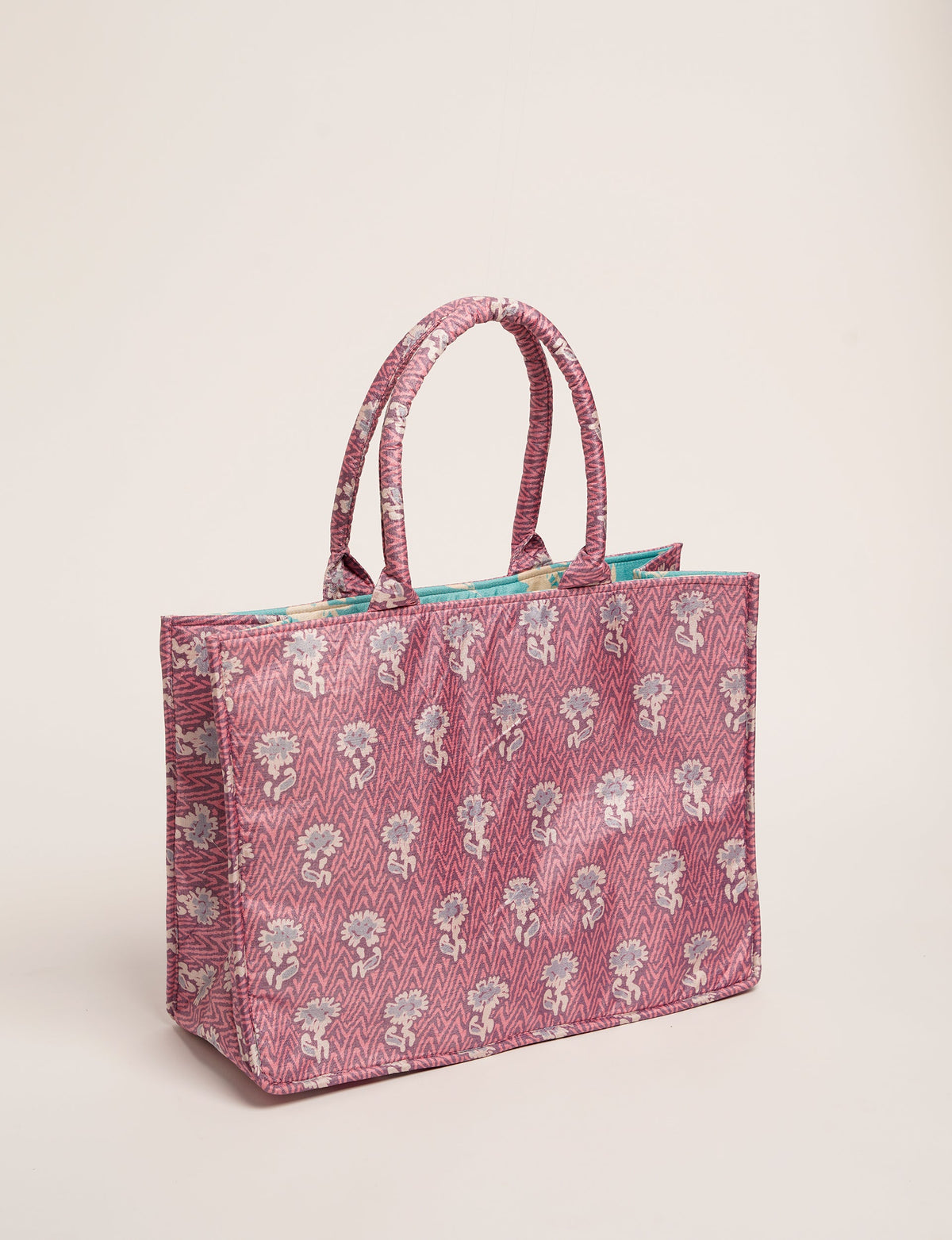 Elevate your eco-friendly style with our Work Tote Bag, a semi-structured, sustainable masterpiece. Soft padded handles, contrast lining, and an inside zipper pocket make it both stylish and functional. Perfect for carrying your laptop and more, this tote stands tall as a symbol of conscious fashion.