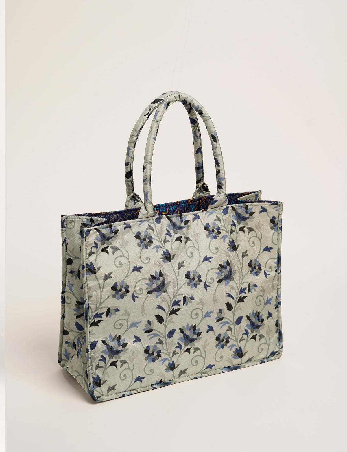 Elevate your eco-friendly style with our Work Tote Bag, a semi-structured, sustainable masterpiece. Soft padded handles, contrast lining, and an inside zipper pocket make it both stylish and functional. Perfect for carrying your laptop and more, this tote stands tall as a symbol of conscious fashion.