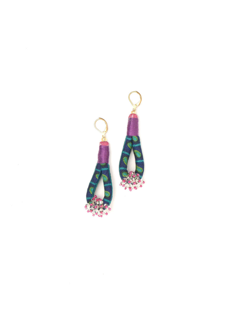 Pair of drop earrings with gold hooks, purple thread wrap, blue-green patterned fabric loops, and pink and clear bead clusters