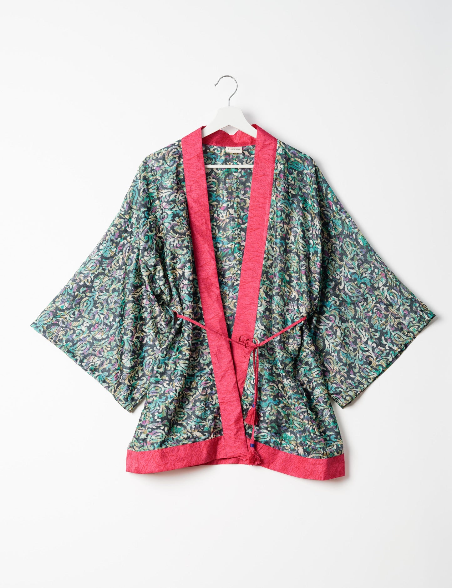 Chic and versatile KIMONO ROBE PRINT with a belt and loose straight-line sleeves. Throw it over swimwear, a t-shirt and shorts, leggings, or jeans for an instant style upgrade. Embrace fashionable versatility with this statement piece.