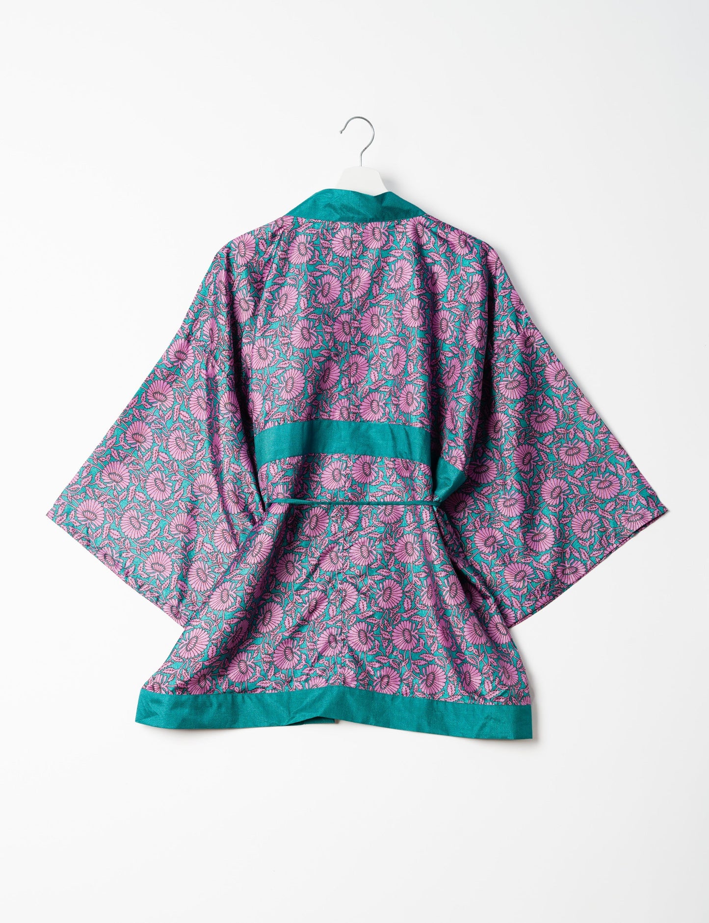 Chic and versatile KIMONO ROBE PRINT with a belt and loose straight-line sleeves. Throw it over swimwear, a t-shirt and shorts, leggings, or jeans for an instant style upgrade. Embrace fashionable versatility with this statement piece.