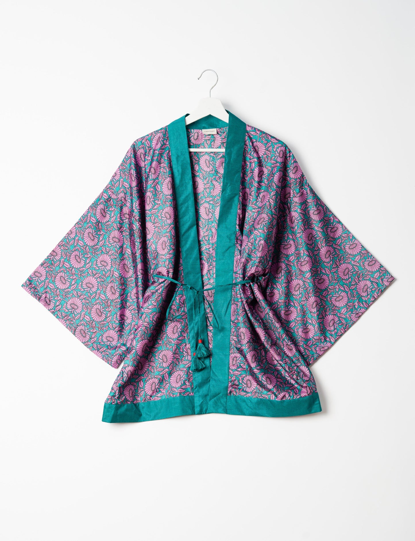 Chic and versatile KIMONO ROBE PRINT with a belt and loose straight-line sleeves. Throw it over swimwear, a t-shirt and shorts, leggings, or jeans for an instant style upgrade. Embrace fashionable versatility with this statement piece.