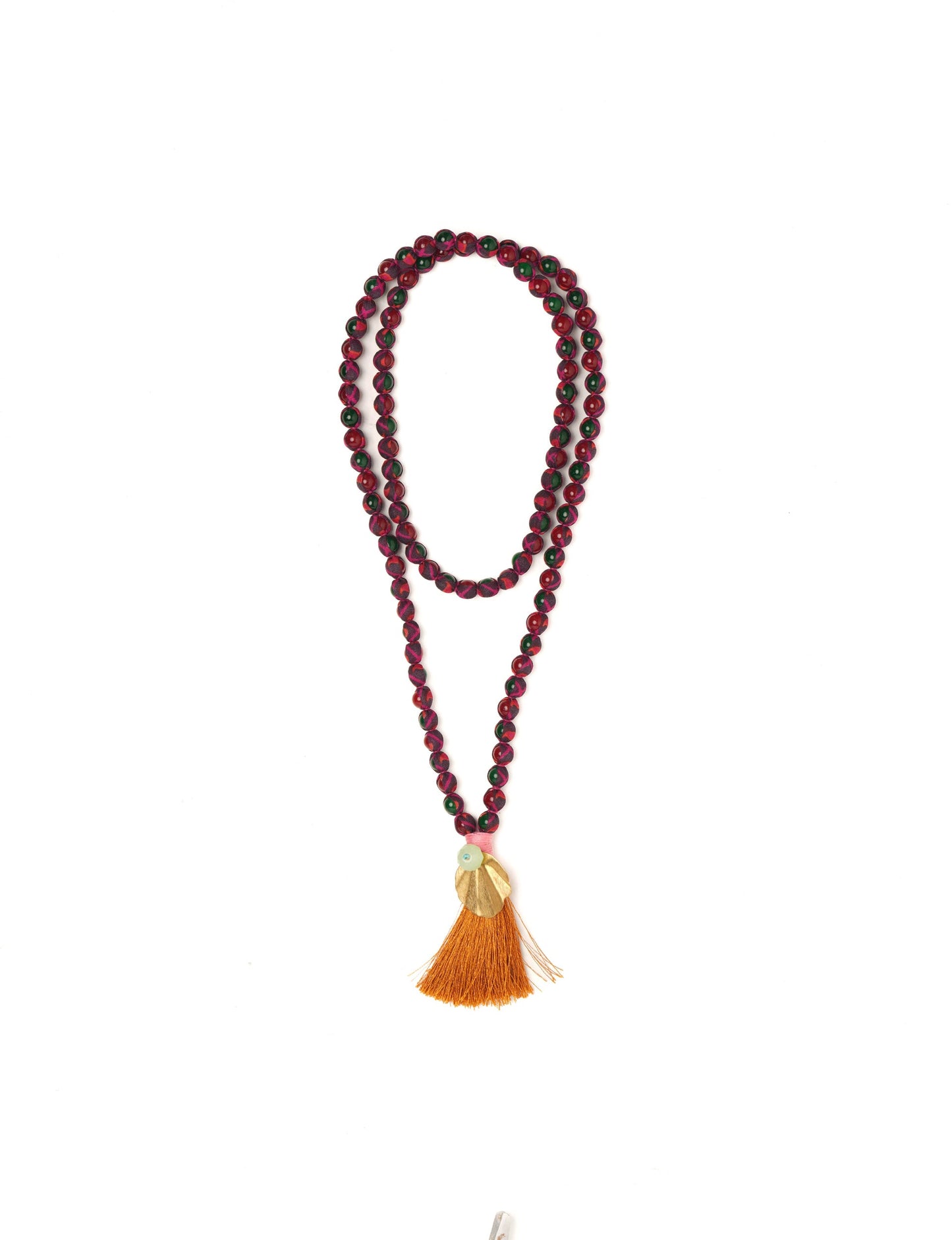 Discover elegance in our Beaded Tassel Necklace, meticulously handcrafted with glass beads, a silk tassel, and a metallic pendant. Hypoallergenic metal hooks provide a skin-friendly and stylish accessory. Length: 57 cm / 22.5 inches.