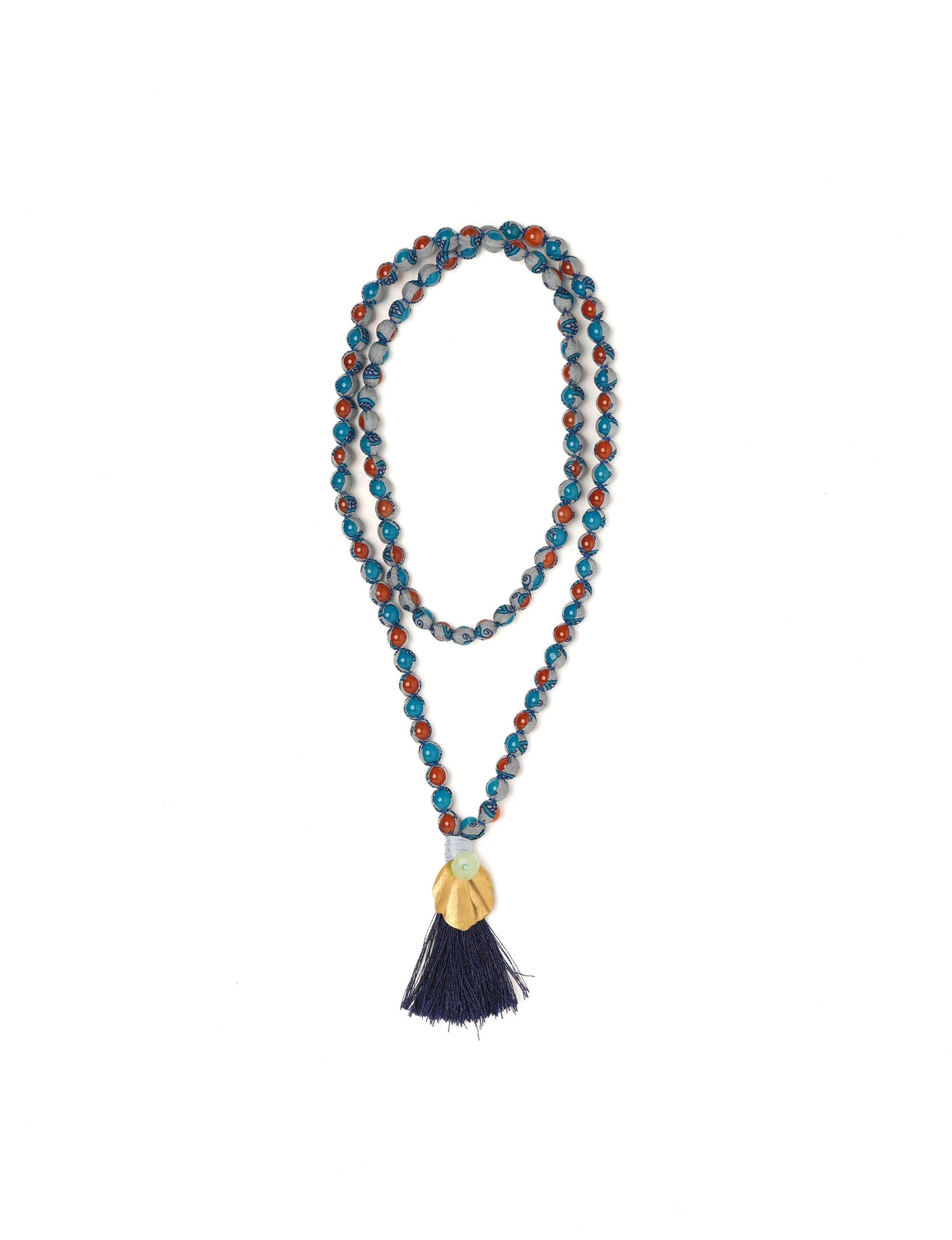 Discover elegance in our Beaded Tassel Necklace, meticulously handcrafted with glass beads, a silk tassel, and a metallic pendant. Hypoallergenic metal hooks provide a skin-friendly and stylish accessory. Length: 57 cm / 22.5 inches.