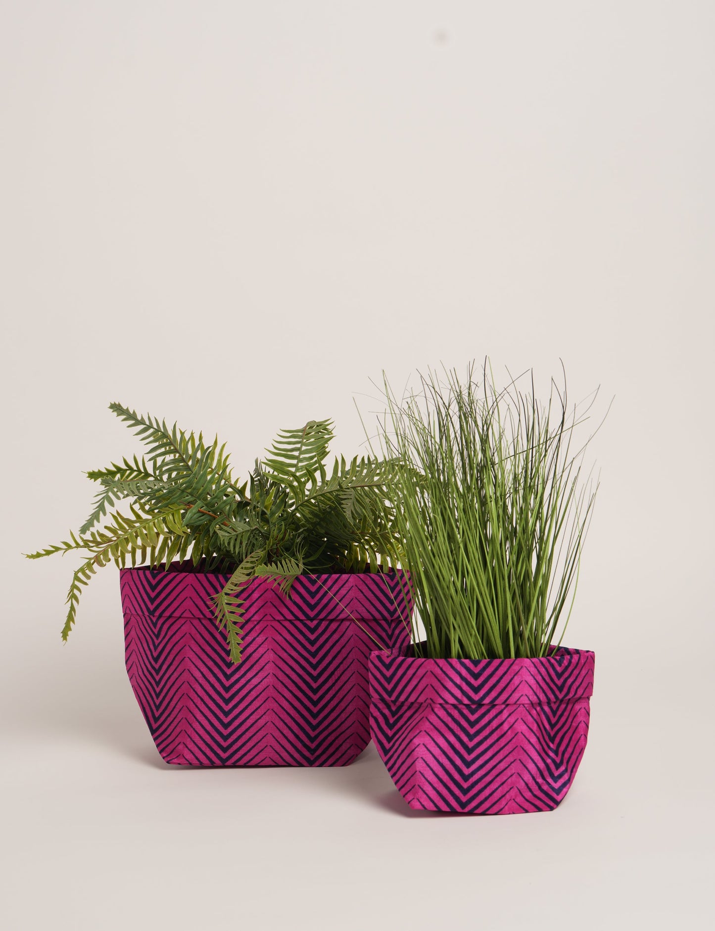 Upgrade your plant aesthetics sustainably with our PLANT POT COVER SET – two handmade covers crafted from preloved saris. Ethical and green, these covers bring eco-friendly charm to your plants and your space.