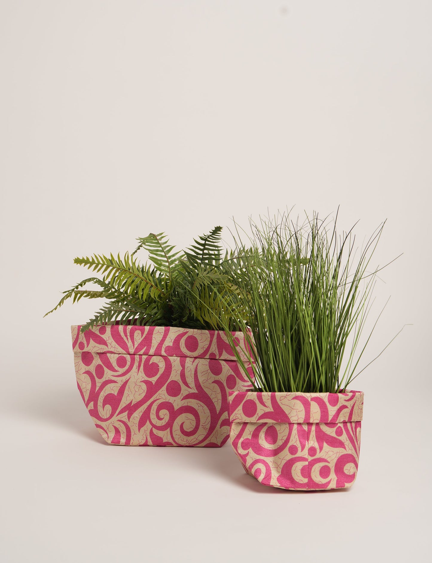 Upgrade your plant aesthetics sustainably with our PLANT POT COVER SET – two handmade covers crafted from preloved saris. Ethical and green, these covers bring eco-friendly charm to your plants and your space.