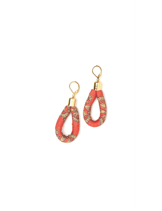 Elevate your style sustainably with our Rope Earrings. Crafted from cotton rope hand-wrapped with pre-loved saris, these earrings are a testament to ethical and green fashion. Make a conscious choice for a brighter, eco-friendly future.