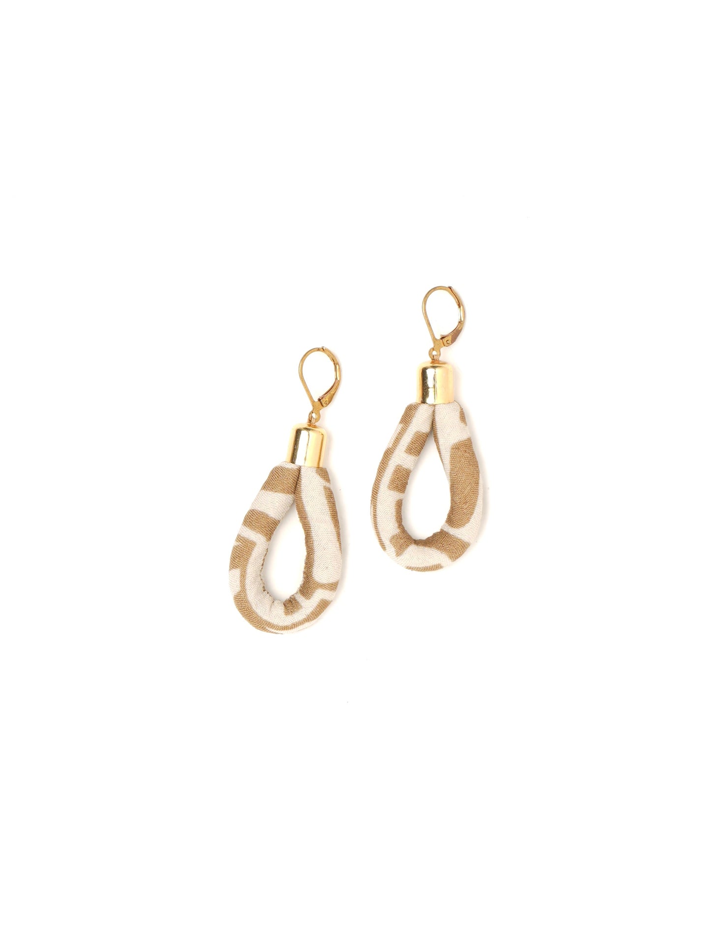 Elevate your style sustainably with our Rope Earrings. Crafted from cotton rope hand-wrapped with pre-loved saris, these earrings are a testament to ethical and green fashion. Make a conscious choice for a brighter, eco-friendly future.