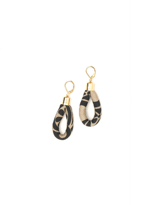 Elevate your style sustainably with our Rope Earrings. Crafted from cotton rope hand-wrapped with pre-loved saris, these earrings are a testament to ethical and green fashion. Make a conscious choice for a brighter, eco-friendly future.