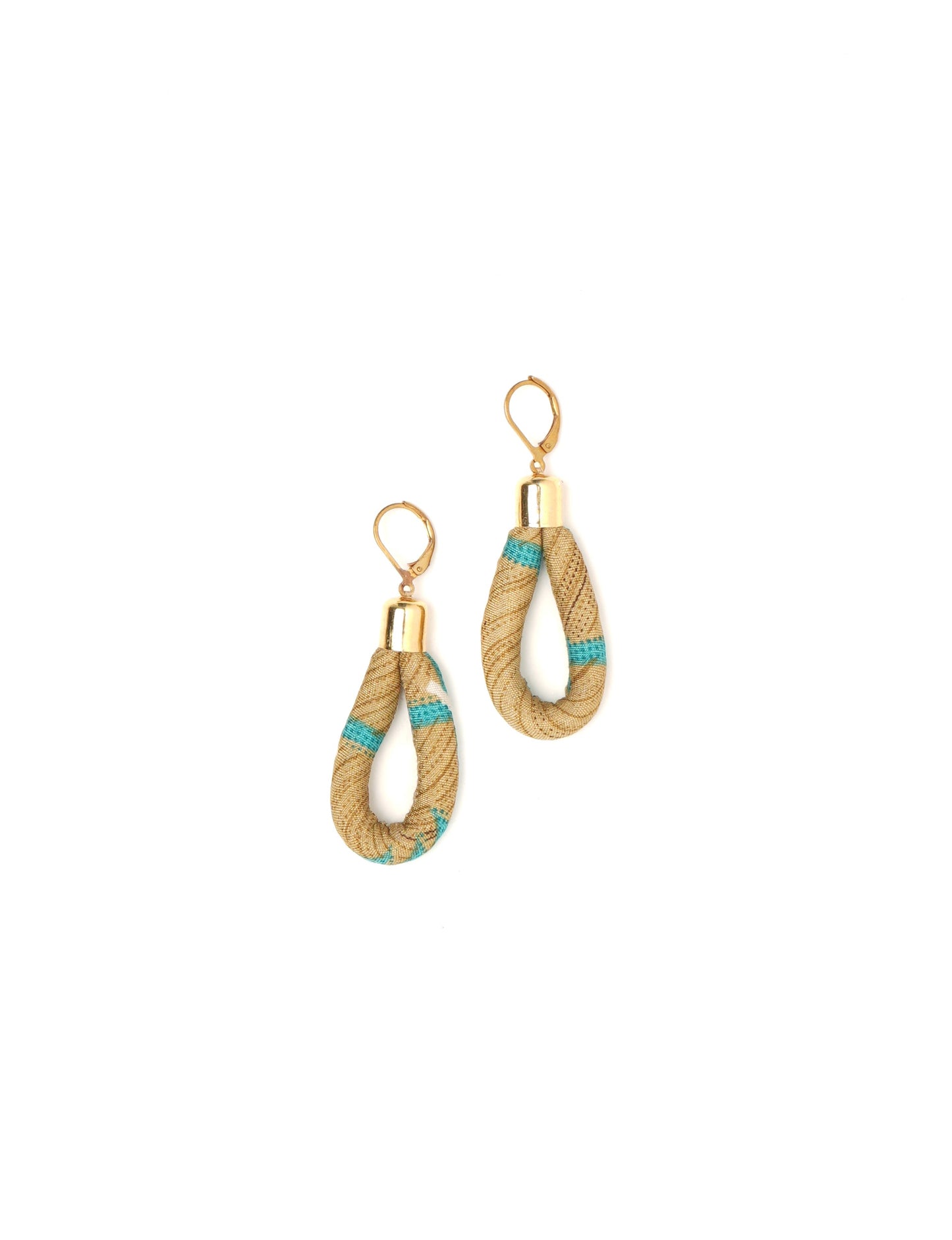 Elevate your style sustainably with our Rope Earrings. Crafted from cotton rope hand-wrapped with pre-loved saris, these earrings are a testament to ethical and green fashion. Make a conscious choice for a brighter, eco-friendly future.