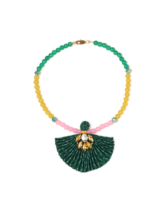 Dive into sustainable fashion with our PLEATED NECKLACE, a creation by talented female artisans in Mumbai. The pleated fan pendant, made from upcycled saris, hangs on a colorful necklace crafted from glass beads, embellished with sparkling glass crystals. An ethical, green fashion statement for conscious styling.