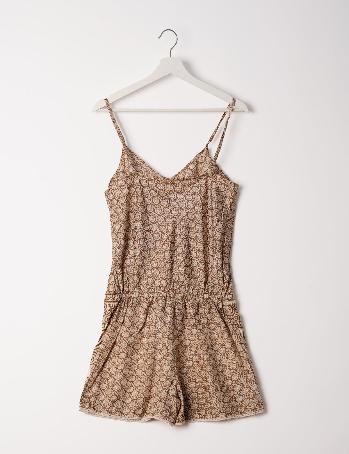 Vibrant playsuit with lace accents, crafted from upcycled saris. Embrace ethical fashion with this unique piece designed for conscious consumers.