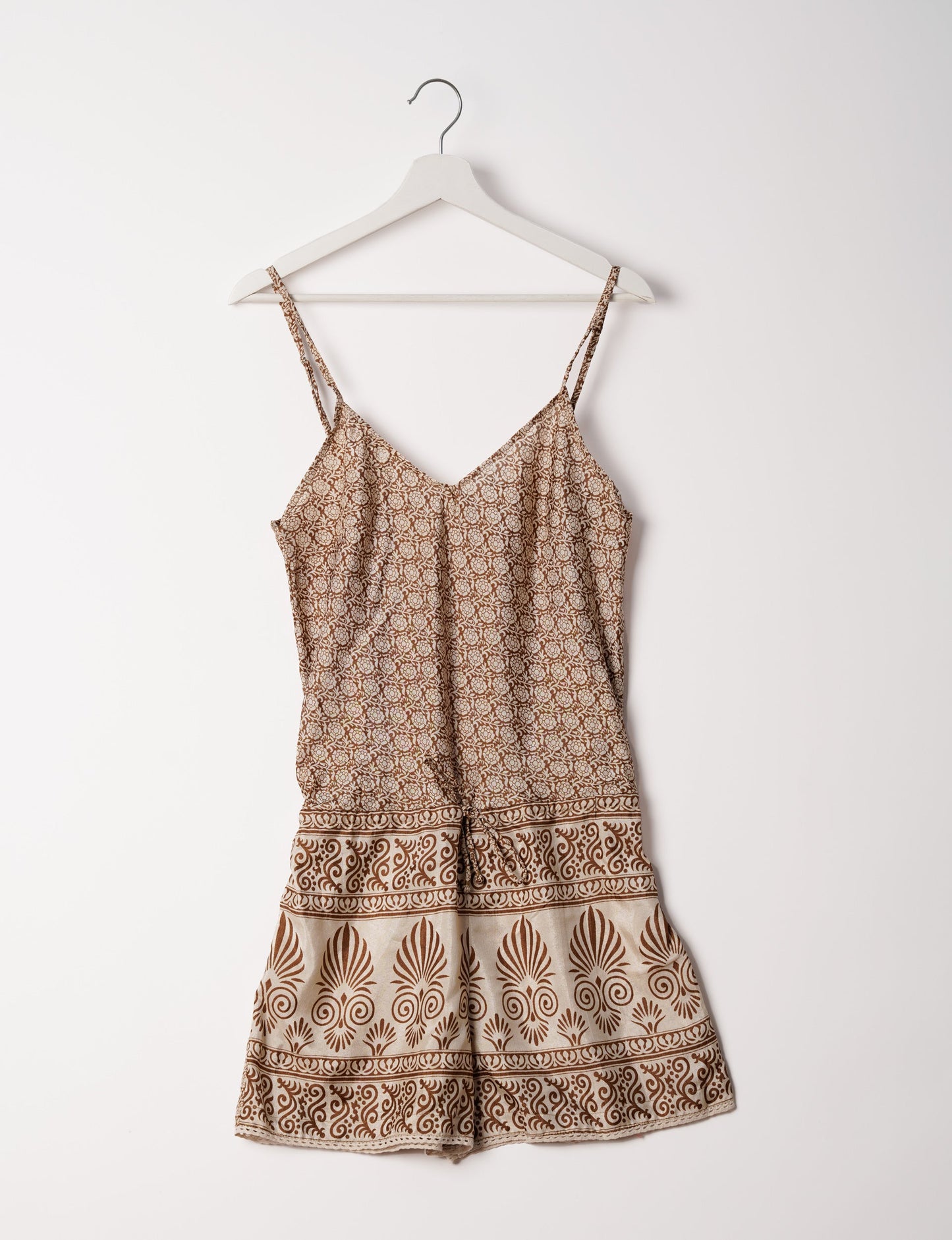 Vibrant playsuit with lace accents, crafted from upcycled saris. Embrace ethical fashion with this unique piece designed for conscious consumers.