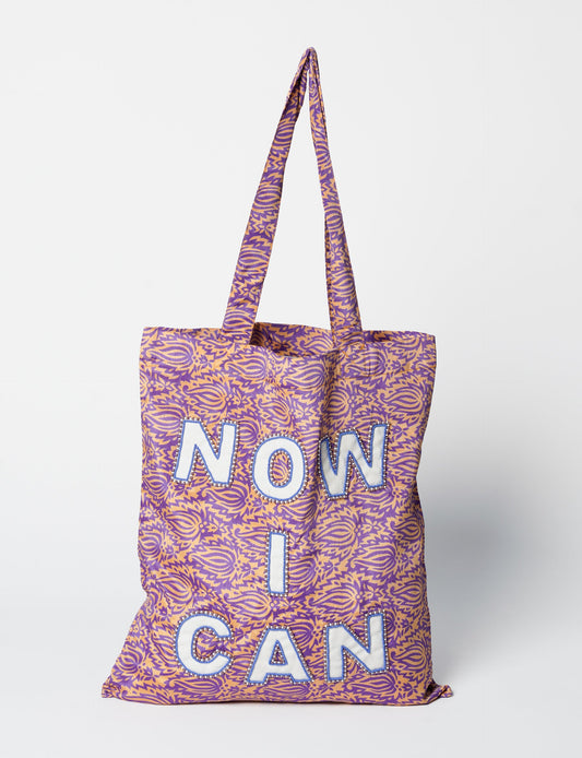 Discover the beauty of ethical fashion with our Embroidered NOW I CAN Sari Shopper Bag, crafted by skilled artisans. Each bag tells a story of empowerment and features signature embroidery, making it a unique statement piece. Perfect for eco-conscious consumers seeking sustainable clothing and green fashion alternatives.
